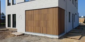 Sectionale garagepoort Allport bekleed met thermowood - Beerse